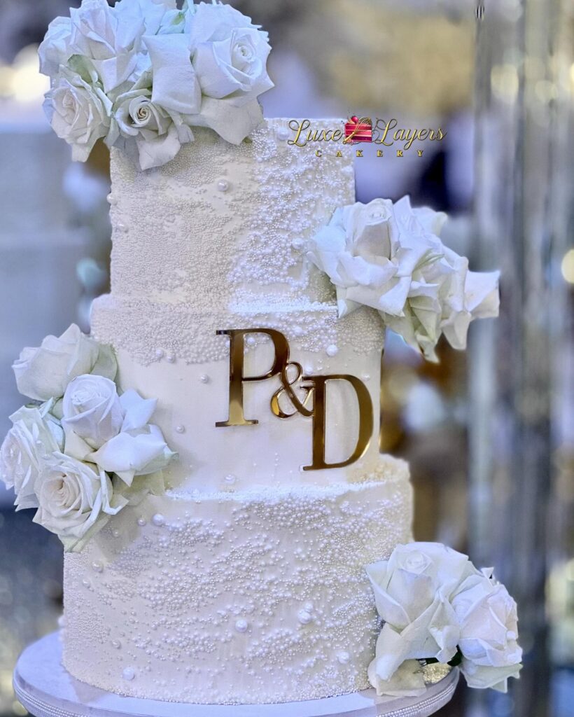 Custom vanilla wedding cake elegant design Miami Luxe Layers Cakery