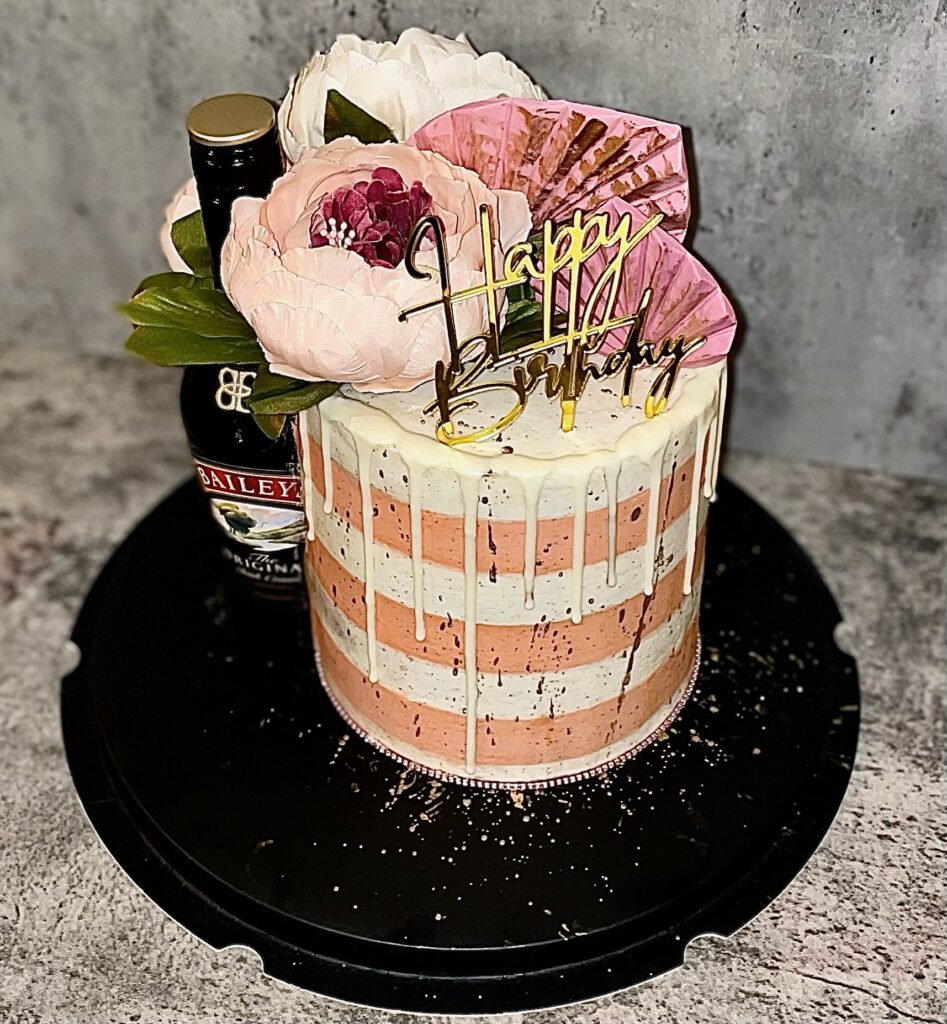 Single-tier glam pop art birthday cake with custom edible image centerpiece, sculpted bubblegum detail, floral topper, and script Happy Birthday topper — custom birthday cakes in Miami by Luxe Layers Cakery