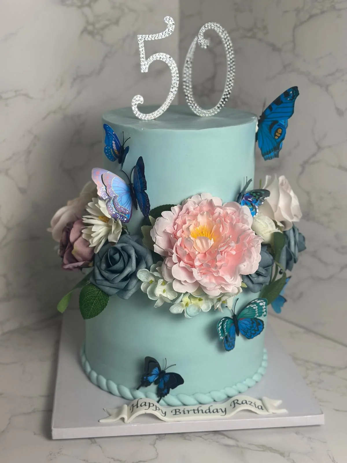 red velvet cake Miami 50th birthday butterfly floral design Luxe Layers Cakery